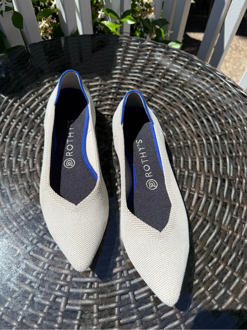 Rothy's Pointed Knit Flats in White with Blue Accent